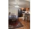 Cozy dining area with table, chairs, and bar seating next to kitchen; a blend of comfort and functionality at 10410 N Cave Creek Rd # 1103, Phoenix, AZ 85020