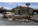 Exterior shot showcases a decorative water fountain, surrounding landscaping, and multiple units at 10410 N Cave Creek Rd # 1103, Phoenix, AZ 85020