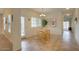 Bright dining nook featuring tile flooring, natural light from large windows, and access to the backyard at 1066 E Sourwood Dr, Gilbert, AZ 85298