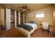 Inviting bedroom with a ceiling fan, built-in closet, and writing desk at 1261 E Edgemont Ave, Phoenix, AZ 85006