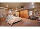 Expansive bedroom with stone accents, desk, and built-in storage at 1261 E Edgemont Ave, Phoenix, AZ 85006