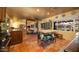 Kitchen with stainless steel appliances, terracotta tile floor, dining area, and island at 1261 E Edgemont Ave, Phoenix, AZ 85006