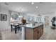 Spacious kitchen featuring granite countertops, stainless steel appliances, and an open concept at 14254 W Cottontail Ln, Surprise, AZ 85387