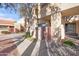 Stylish condo with a gated entrance, lush landscaping, and convenient walking paths at 1432 W Emerald Ave # 742, Mesa, AZ 85202