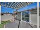 Covered patio area featuring a sliding glass door leading to the house at 148 N Glenview --, Mesa, AZ 85213