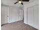 This bedroom features neutral paint, carpet, and a closet with sliding doors at 148 N Glenview --, Mesa, AZ 85213