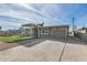 Cozy single-story home with a covered patio and a driveway that leads to an attached garage at 148 N Glenview --, Mesa, AZ 85213