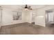 Bedroom featuring carpet, ceiling fan, and attached bath at 15466 W Shangri La Rd, Surprise, AZ 85379