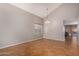 An open-concept dining room featuring tile floors, and neutral-toned walls at 15466 W Shangri La Rd, Surprise, AZ 85379