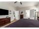 View of the main bedroom with an expansive closet, neutral tones, and an ensuite bathroom at 16993 W Shiloh Ave, Goodyear, AZ 85338