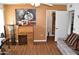 Comfortable guest bedroom featuring a ceiling fan, laminate floors, and bright lighting at 17626 N Buntline Dr, Sun City West, AZ 85375