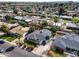 Aerial view of a charming neighborhood featuring well-maintained homes, mature trees, and manicured landscaping at 1837 E Coolidge St, Phoenix, AZ 85016