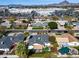 Aerial view showcases a well-maintained neighborhood, mature trees, and convenient access to nearby shopping areas at 1837 E Coolidge St, Phoenix, AZ 85016