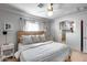 Serene bedroom with bright white walls, natural light, and a view to an adjacent shower at 1837 E Coolidge St, Phoenix, AZ 85016