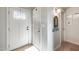 Bright entryway featuring neutral tones, wood-look flooring and a modern white front door at 1837 E Coolidge St, Phoenix, AZ 85016