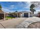 Charming home with a well-manicured lawn, mature landscaping, and a spacious two-car garage at 1837 E Coolidge St, Phoenix, AZ 85016