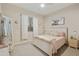 Bright bedroom featuring a ceiling fan, a decorative painting, and an updated bed set at 18501 W Galveston St, Goodyear, AZ 85338