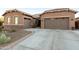 Beautiful single-story home with desert landscaping and a two-car garage at 18501 W Galveston St, Goodyear, AZ 85338