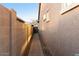 A side yard offers a walkway along the side of the home at 18501 W Galveston St, Goodyear, AZ 85338