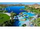 Aerial view of community water park with pools and palm trees at 18501 W Galveston St, Goodyear, AZ 85338