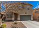 Charming two-story home with a well-maintained front yard and a two-car garage at 19259 N Ventana Ln, Maricopa, AZ 85138