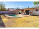 Backyard features a pool with a patio and an outdoor dining set at 1926 E El Moro Ave, Mesa, AZ 85204