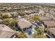 Aerial view showcasing a home with a pool, spa, basketball court and professional landscaping at 21432 N 77Th Pl, Scottsdale, AZ 85255