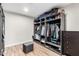 Walk-in closet with custom shelving for optimal organization of clothing, shoes, and personal belongings at 217 W Montecito Ave, Phoenix, AZ 85013