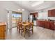 Cozy dining area with sliding glass doors offering a view to the outdoor space and backyard at 24108 N Nectar Ave, Florence, AZ 85132