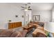 Inviting living room with a large sectional sofa, hardwood floors, and contemporary decor at 24108 N Nectar Ave, Florence, AZ 85132