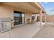 Covered patio with a grill and outdoor seating, perfect for entertaining at 24108 N Nectar Ave, Florence, AZ 85132