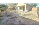 The backyard features a gravel yard and a covered patio at 2541 S Sunnyvale Ave, Gilbert, AZ 85295