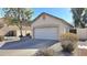 Detached two car garage provides ample parking and storage space and is surrounded by xeriscaped landscaping at 2541 S Sunnyvale Ave, Gilbert, AZ 85295