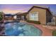 Relaxing backyard pool with a pergola, BBQ, and patio furniture, perfect for outdoor entertaining at 2571 E Balsam Ct, Chandler, AZ 85286