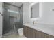 Bathroom featuring a walk-in shower and a modern floating vanity at 2642 N Fiesta St, Scottsdale, AZ 85257