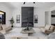 Modern living room featuring a stylish fireplace, neutral decor, and inviting seating area at 2642 N Fiesta St, Scottsdale, AZ 85257