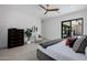 This primary bedroom features recessed lighting, a ceiling fan, and is adjacent to a walk-in closet at 2642 N Fiesta St, Scottsdale, AZ 85257