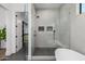 Sleek bathroom with a glass enclosed shower and modern gold fixtures at 2643 N Fiesta St, Scottsdale, AZ 85257