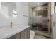 Modern bathroom with glass shower, floating vanity, and neutral color palette at 2643 N Fiesta St, Scottsdale, AZ 85257