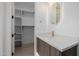 Modern bathroom with floating vanity opens to walk-in closet at 2643 N Fiesta St, Scottsdale, AZ 85257