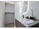 Bright bathroom featuring a vanity with a quartz countertop and contemporary fixtures at 2643 N Fiesta St, Scottsdale, AZ 85257