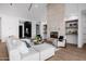 Cozy living room featuring a modern fireplace, comfortable seating, and bright, open spaces at 2643 N Fiesta St, Scottsdale, AZ 85257