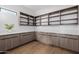 Pantry area with open shelving, white counters, and matching cabinets at 2643 N Fiesta St, Scottsdale, AZ 85257