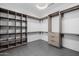 Spacious walk-in closet featuring custom shelving and modern design at 2643 N Fiesta St, Scottsdale, AZ 85257