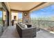 Spacious balcony with comfortable seating and a beautiful view at 27000 N Alma School Pkwy # 2019, Scottsdale, AZ 85262