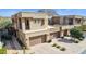 Contemporary home with desert landscaping and a two-car garage at 27000 N Alma School Pkwy # 2019, Scottsdale, AZ 85262