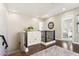 View of the upstairs landing with wood floors, and a bedroom in the background at 27000 N Alma School Pkwy # 2019, Scottsdale, AZ 85262