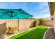 Enjoy outdoor living with this view of the home's manicured backyard and mature landscaping at 287 N Jesse St, Chandler, AZ 85225