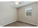 Neutral bedroom with window for natural light and ceiling fan for added comfort at 287 N Jesse St, Chandler, AZ 85225