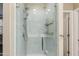 Modern walk-in shower with glass door and walls, a showerhead, and chrome accents at 287 N Jesse St, Chandler, AZ 85225